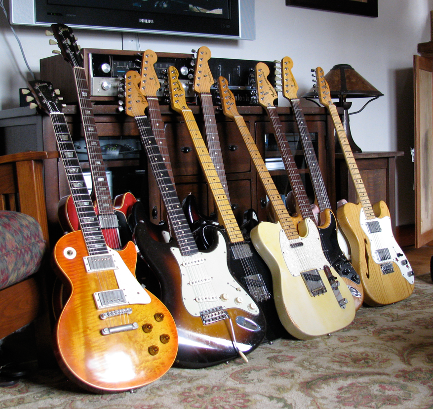 pile_o_guitars.png
